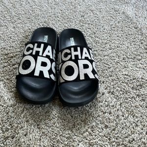 MICHAEL Michael Kors Black Slides with Silver Logo